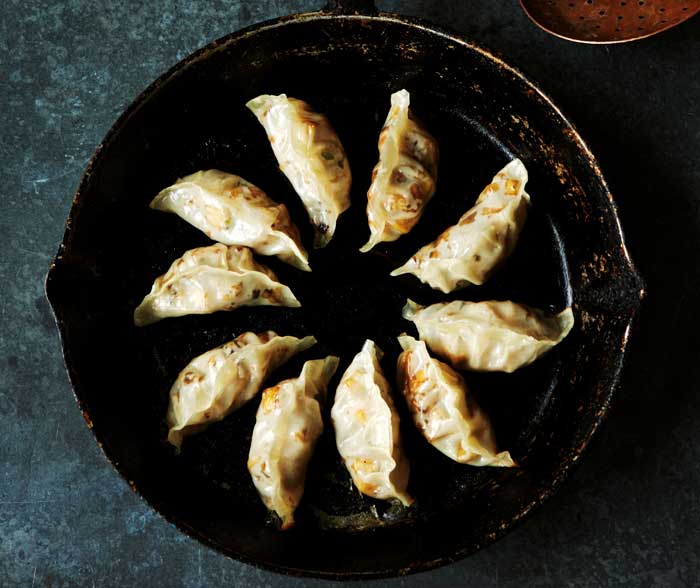 Vegan Gyoza with Mushroom & Tofu Filling in a metal pan