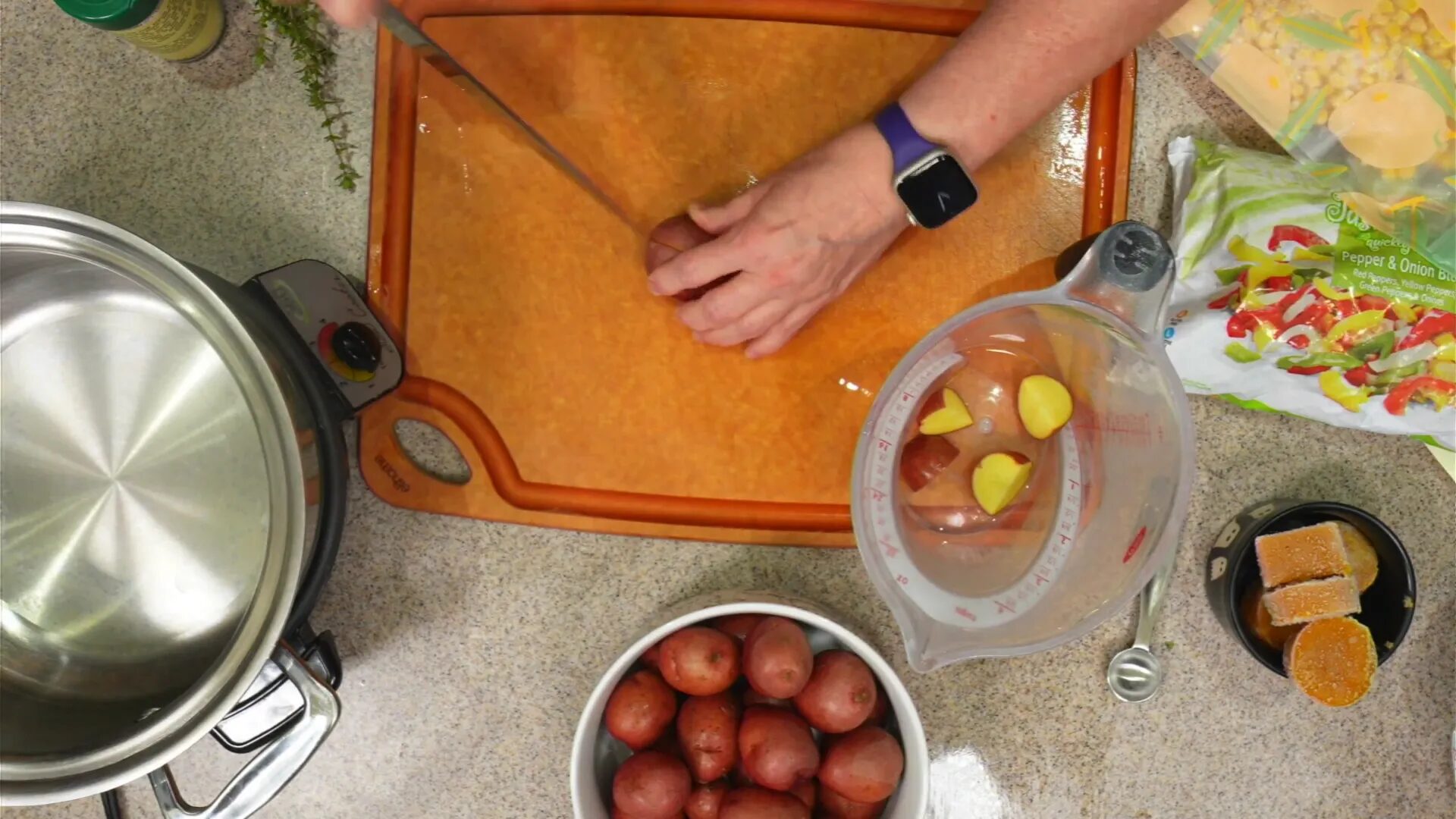 Chopping red potatoes