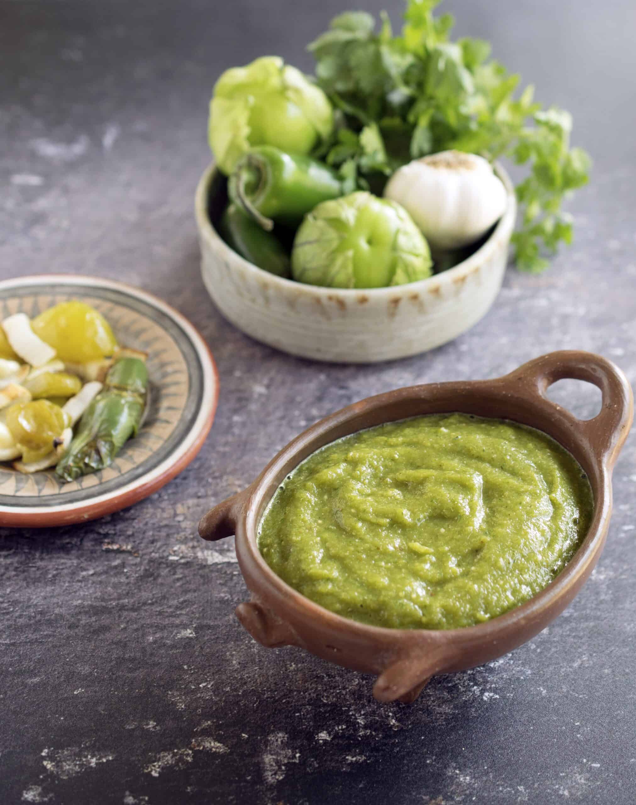 salsa verde in clay pig bowl