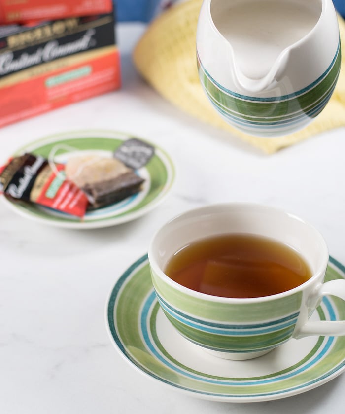 Cashew Almond Vegan Creamer in a small jar and tea in a cup