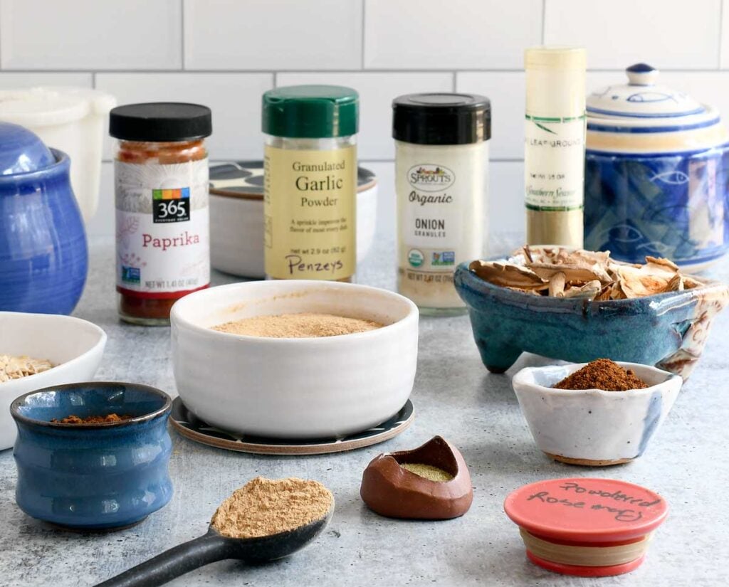 Easy Vegan Beef Broth Powder surrounded by all the ingredients you need to make it.