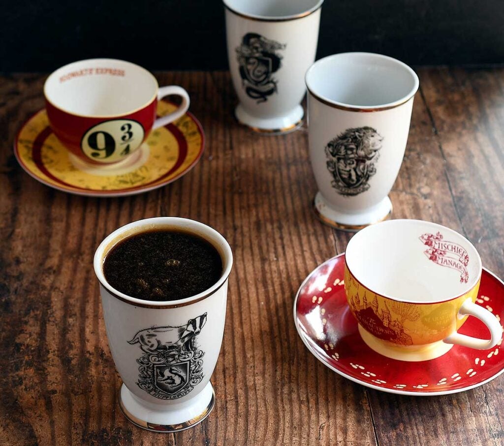 Vegan butterbeer syrup in a Hufflepuff fancy handleless mug.