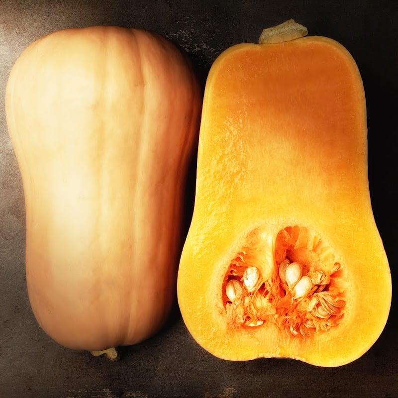 Butternut squash cut in half.