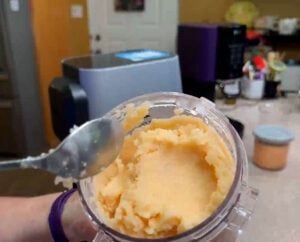 Checking for creaminess in a spun int of Ninja Creami ice cream