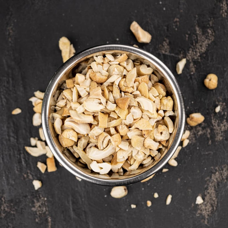 cashew pieces in a glass jar