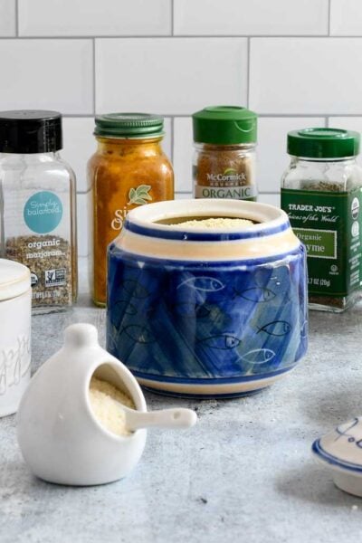 Vegan gravy mix in a blue pottery jar.