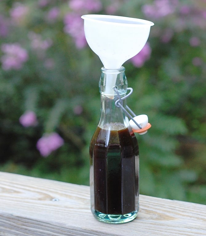 Perfectly strained lavender syrup on a bottle for your coffee and tea on a wooden table