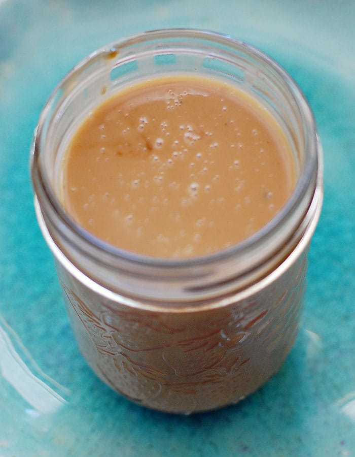 Iced Thai Tea Concentrate with Sweetened Condensed Coconut Milk Homemade Sweetened Condensed Coconut Milk in a mason jar