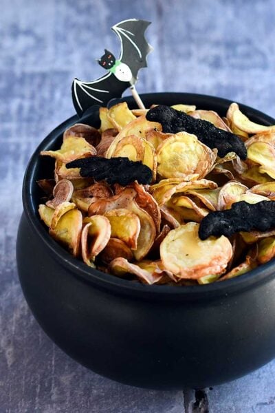 Potato chips made from yellow fingerling potatoes with halloween decorative bat chips made with
