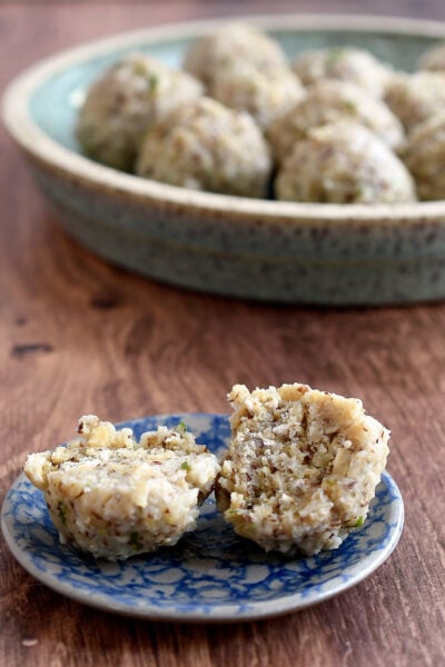 Gluten-free and vegan oat matzo balls cooked in salted water.