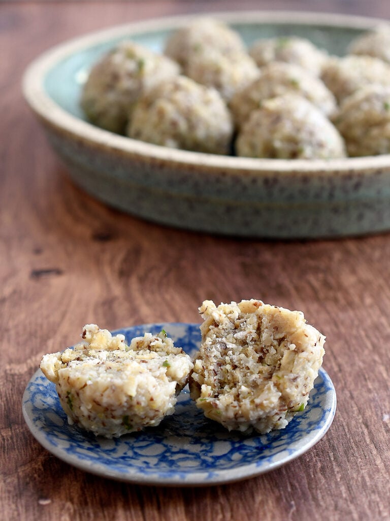 Gluten-free and vegan oat matzo balls cooked in salted water.
