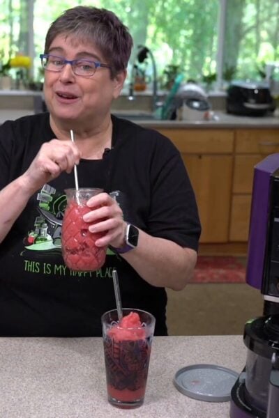 Kathy drinking a strawberry slushie