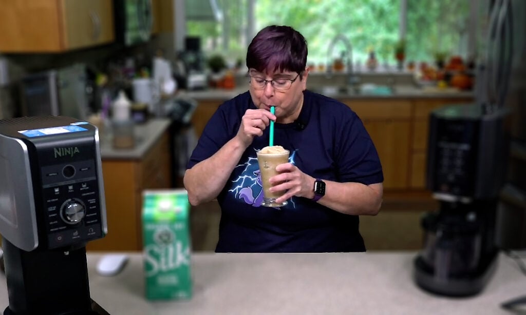 Kathy drinking a creamicinno