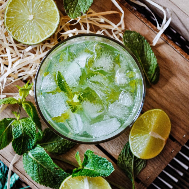 Cocktail with lime, mint, and mint vodka