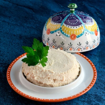 Okara Ricotta in a fancy cheese domed plate