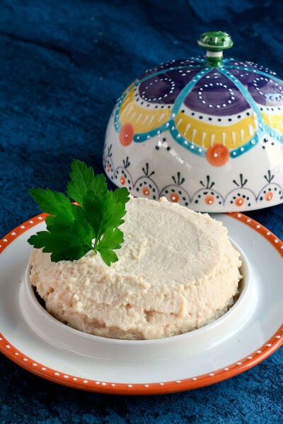Okara Ricotta in a fancy cheese domed plate