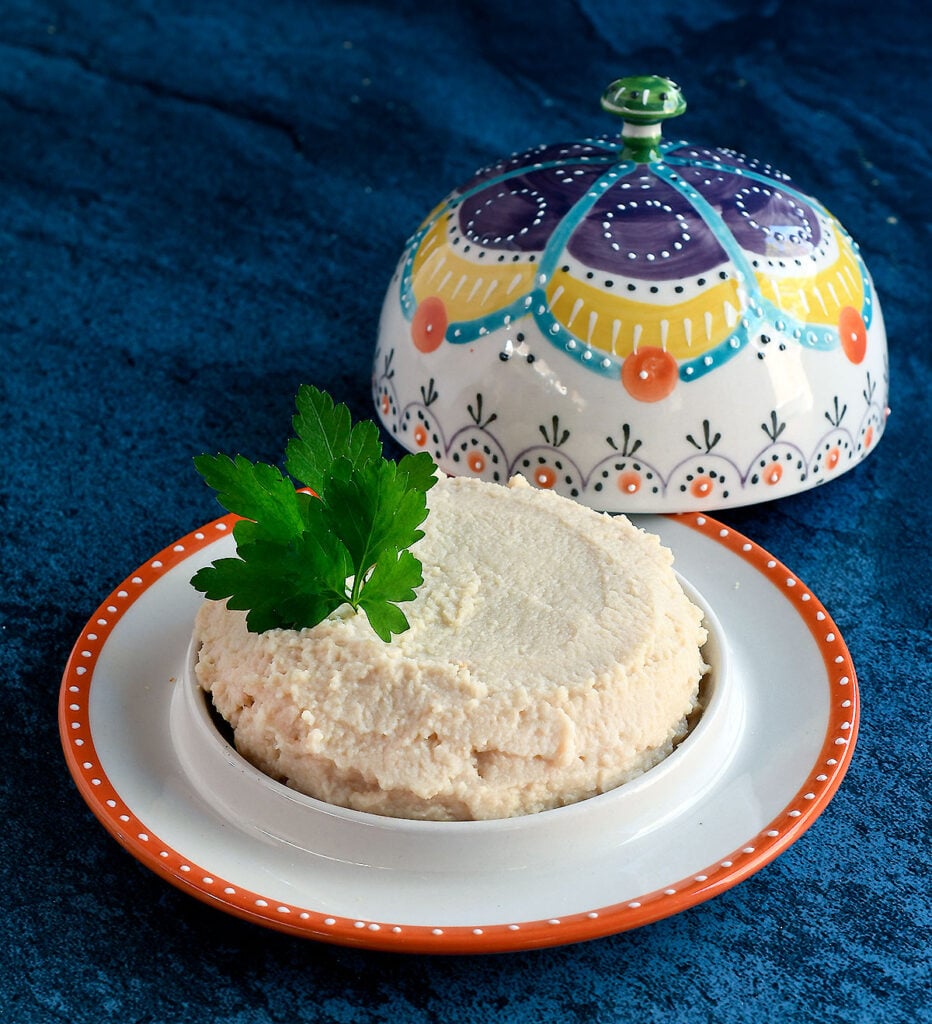 Okara Ricotta in a fancy cheese domed plate