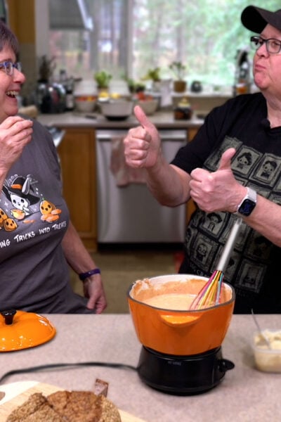 Kathy and Cheryl tasting the vegan pizza fondue