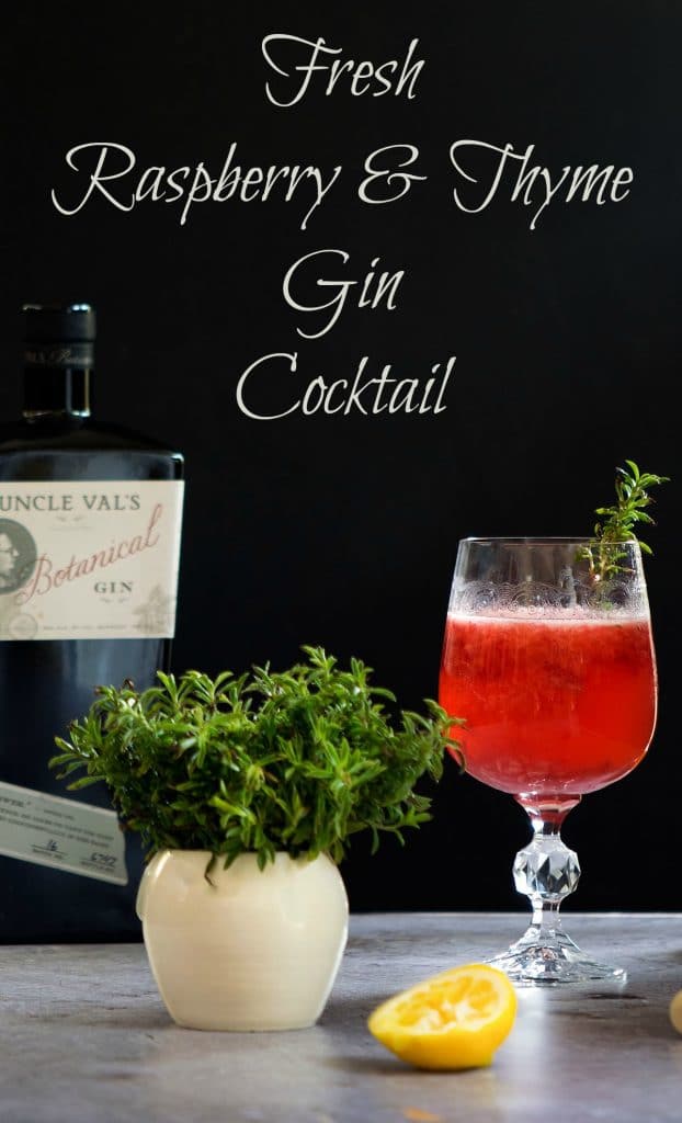 Fresh Raspberry Gin Cocktail with Thyme featuring Uncle Val's Botanical Gin on black background
