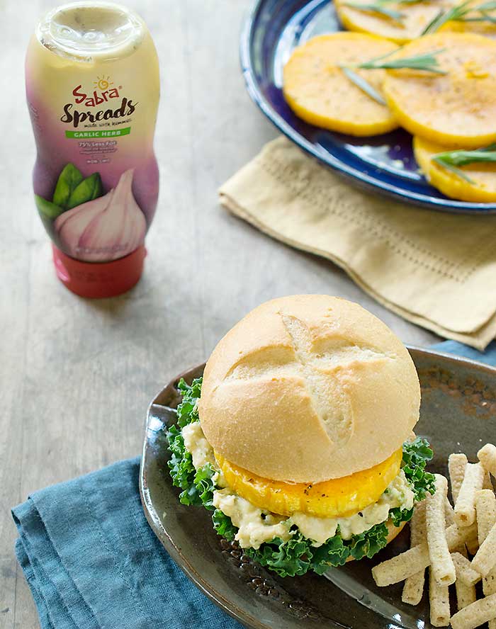 Roasted Butternut Squash Veggie Burgers served with potato fries and with Sabra Spread
