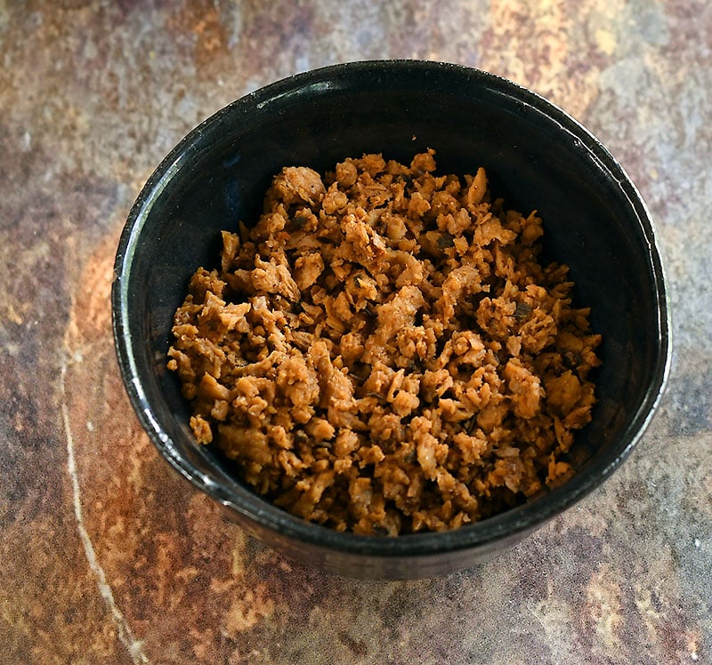 A bowl of minced Butler's soy curls with taco seasoning.