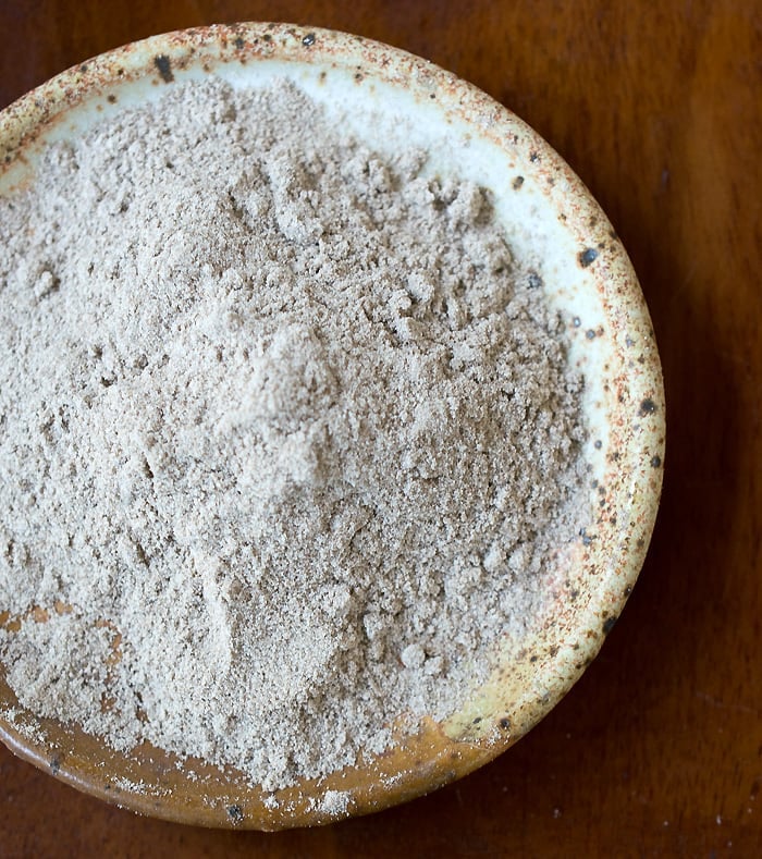 Brown Teff Flour on a brown pottery plate