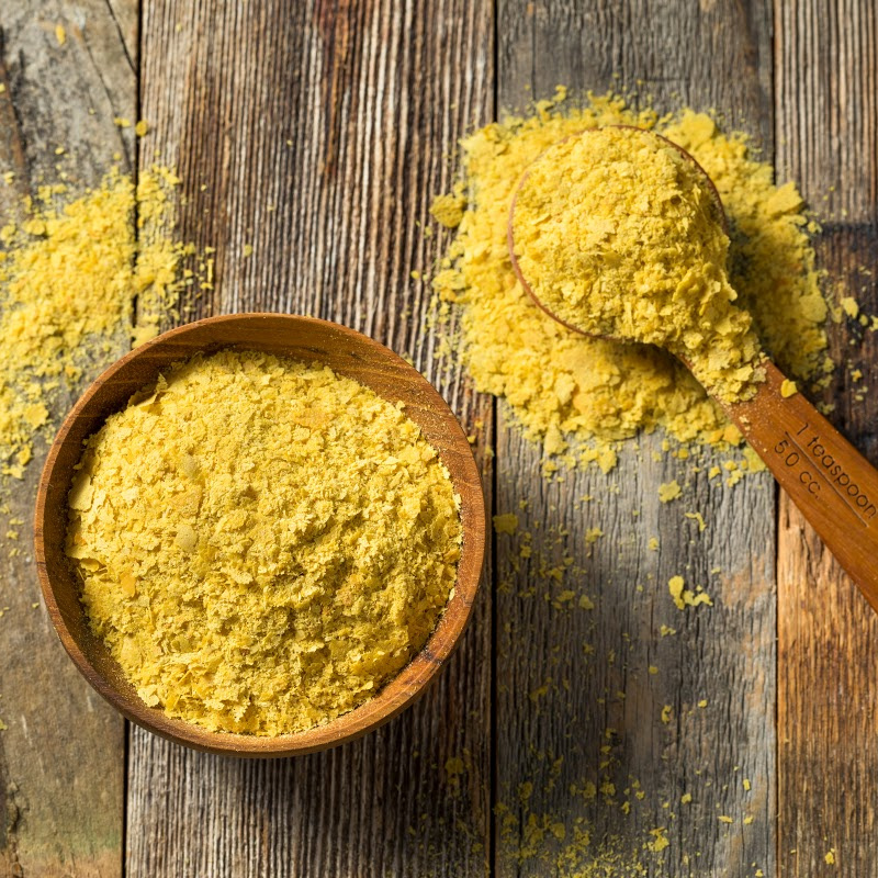 nutritional yeast in a wooden bowl