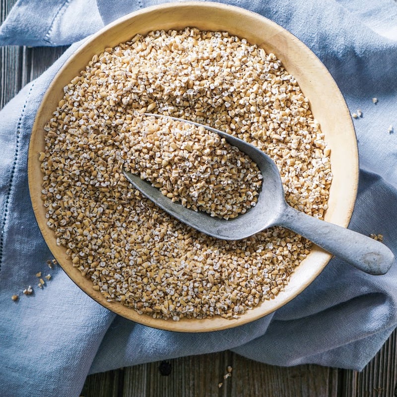 steel-cut oats in bowl metal scoop