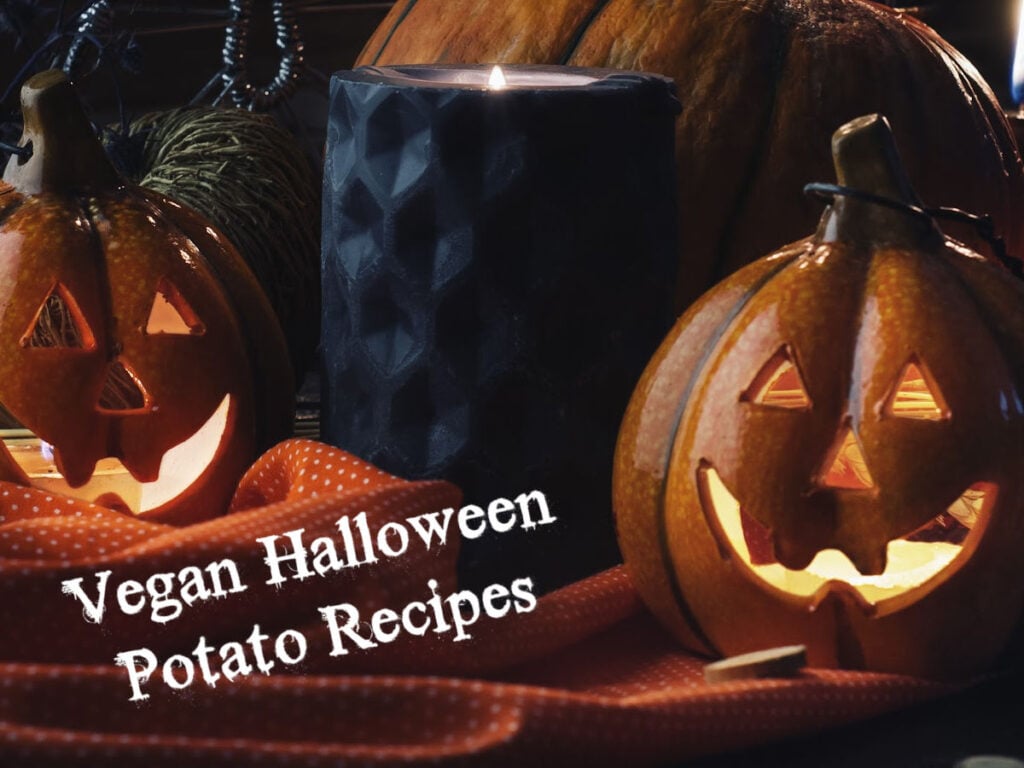 Jack-o-lanterns with a black candle