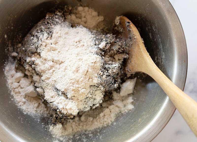 Mix in the flour and the spices to the vegan sausage mix