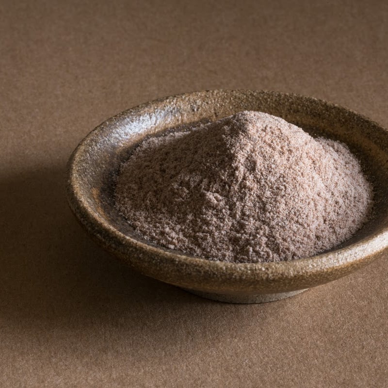 Brown Teff Flour in Brown Ceramic Bowl