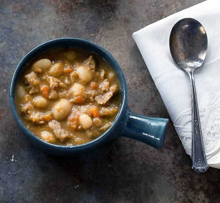 Instant Pot Caballero Bean & Soy Curl Chili in a blue pottery soup bowl with a handle