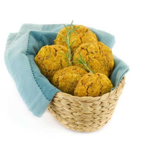 Vegan Pumpkin Drop Biscuits in a Basket with blue napkin