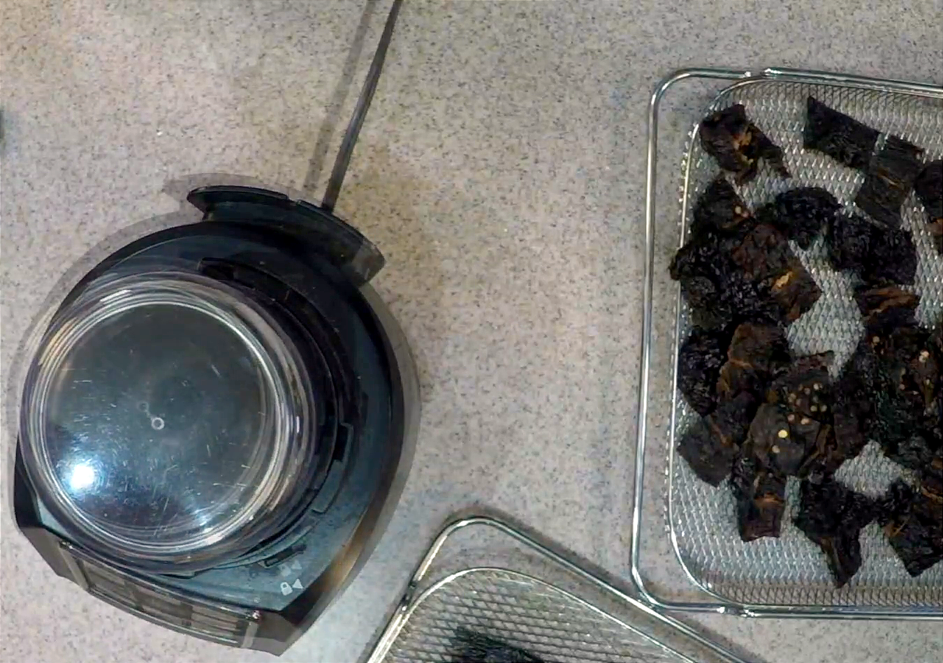 Grinding dried chiles into powder