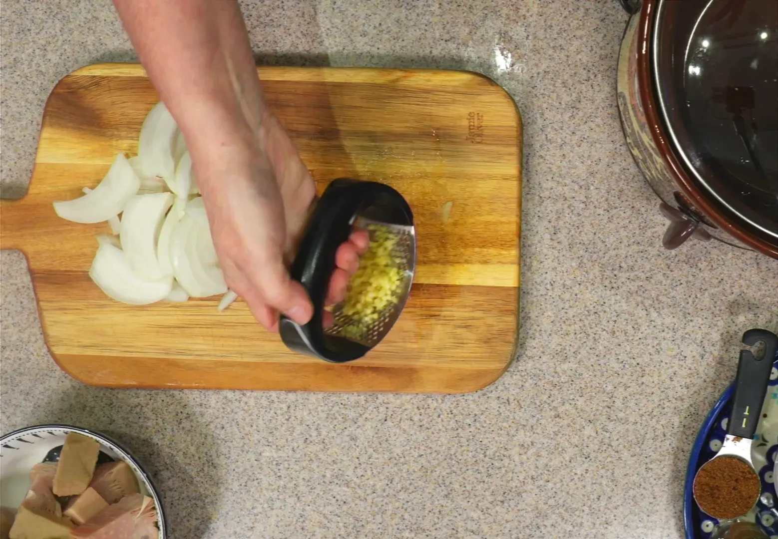 Mushing garlic