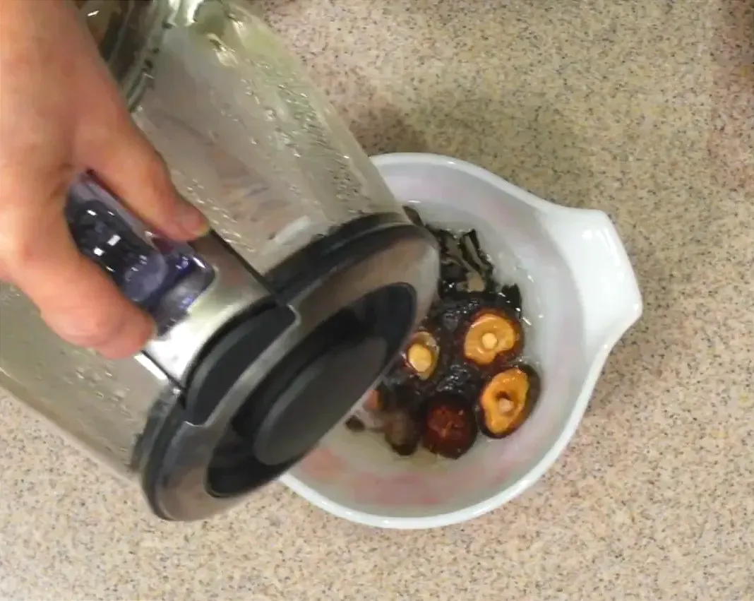 Soaking dried mushrooms in hot water